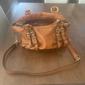 Brown Michael Kors purse.